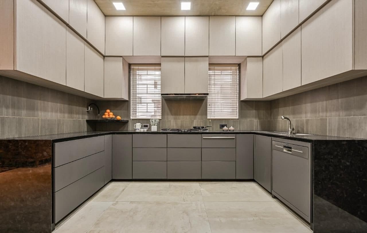A Bungalow — The graphite-and-cream U-shaped kitchen