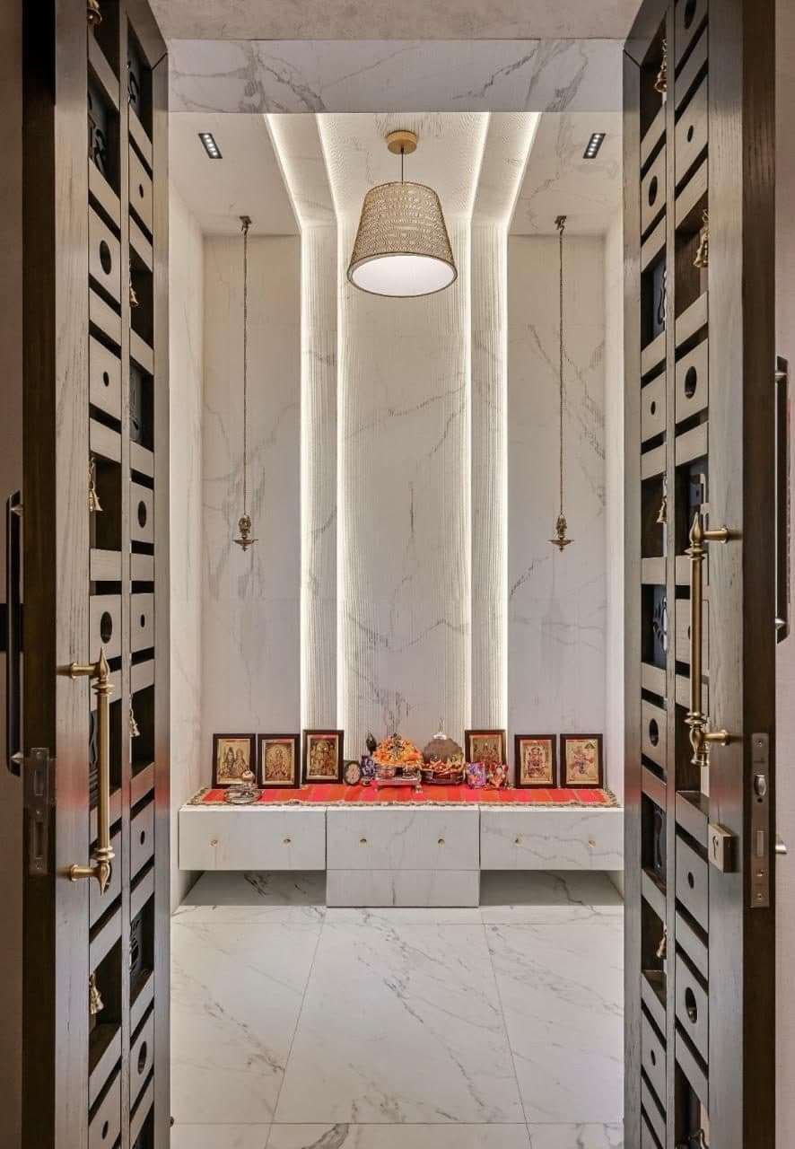 A Bungalow — The mandir, in marble behind fretwork doors