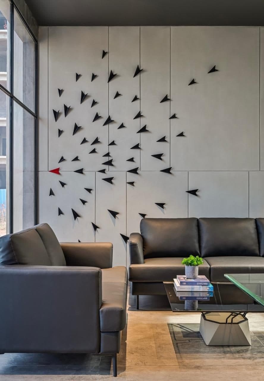 Freedom Towers — Lounge seating beneath the flocking-birds installation