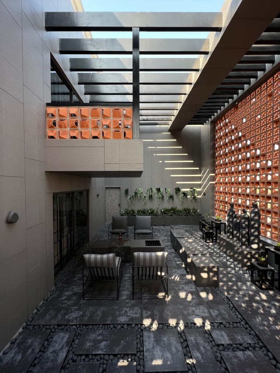 A Luxury Bungalow — The semi-covered terrace and stair, from the court